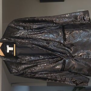 H & M black women's dinner jacket.